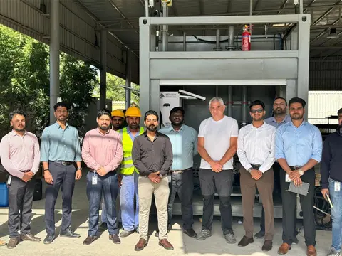 Project team and partners in front of the portable fueling unit